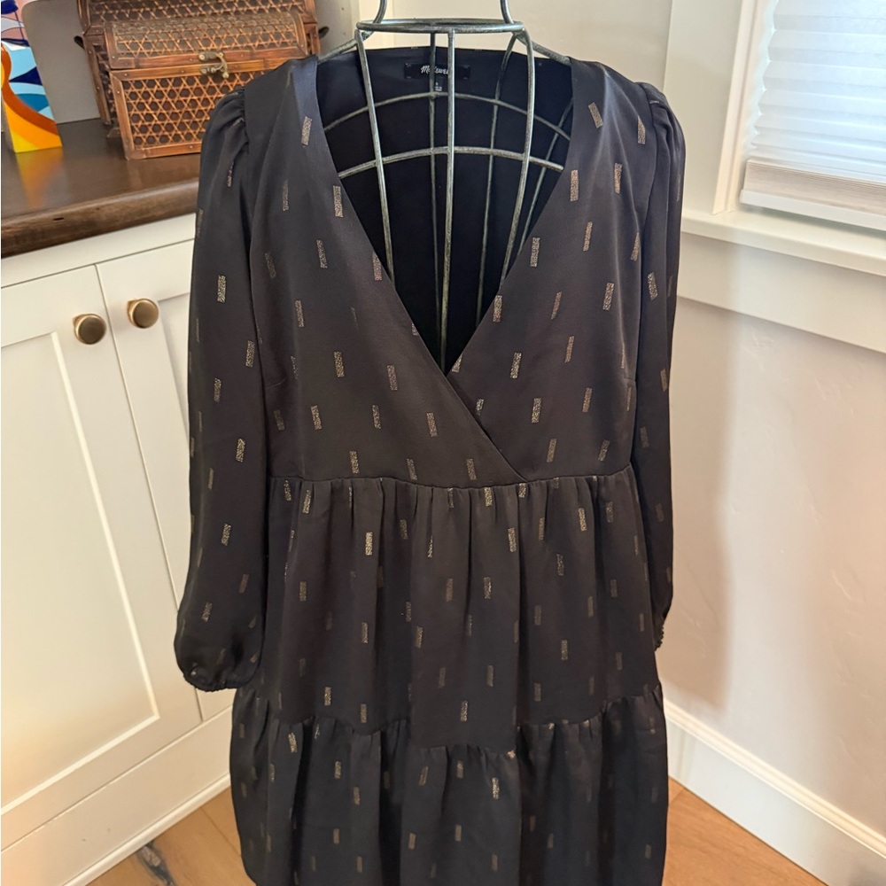 Elegant Black Dress with Subtle Gold Accents